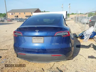 2023 Tesla Model Y Long Range with VIN 7SAYGDEE3PA114256, listed as a IAAI auction lot 42158307 with 19,975 mi miles and . Bid and sale history available at DreamBid. Image 15.