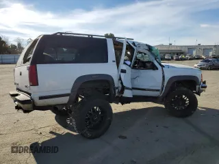 1997 GMC Suburban with VIN 3GKFK16R1VG507044, listed as a Copart auction lot 87302674 with 193,670 mi miles and Salvage Title. Bid and sale history available at carsss.com. Image 3.