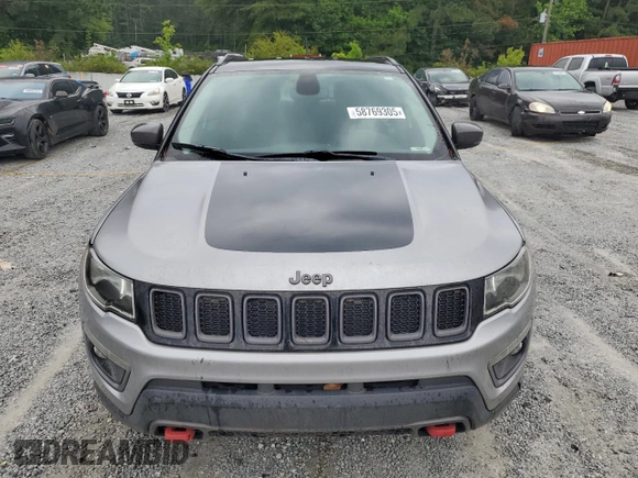 2018 Jeep Compass Trailhawk with VIN 3C4NJDDB4JT451409, listed as a Copart auction lot 58769305 with 135,562 mi miles and Clean title. Bid and sale history available at DreamBid. Image 5.