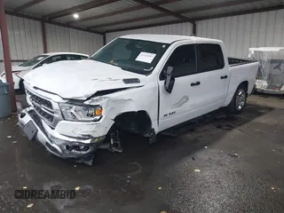 2023 Ram 1500 Big Horn z VIN 1C6RRFFG7PN698664, wystawiony jako IAAI lot #41103495 z przebiegiem 34 307 mil mil oraz . Historia ofert i sprzedaży dostępna na DreamBid. Obrazek 18.