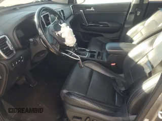 2018 Kia Sportage EX z VIN KNDPNCAC1J7308457, wystawiony jako Copart lot #81574704 z przebiegiem Nie podano mil oraz Szkoda całkowita • Salvage title. Historia ofert i sprzedaży dostępna na DreamBid. Obrazek 7.