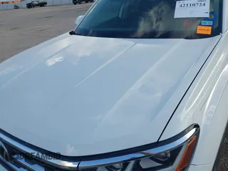 2021 Volkswagen Atlas SEL with VIN 1V2BR2CAXMC522670, listed as a IAAI auction lot 42110724 with 58,802 mi miles and . Bid and sale history available at DreamBid. Image 6.