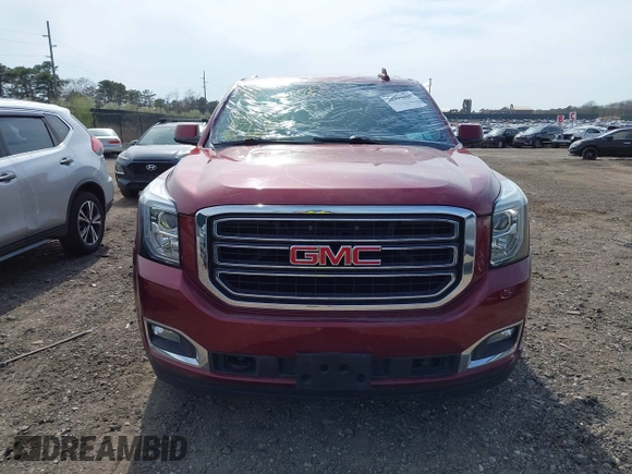 2016 GMC Yukon SLT z VIN 1GKS2BKC5GR363538, wystawiony jako IAAI lot #42095008 z przebiegiem 92 317 mil mil oraz . Historia ofert i sprzedaży dostępna na DreamBid. Obrazek 12.