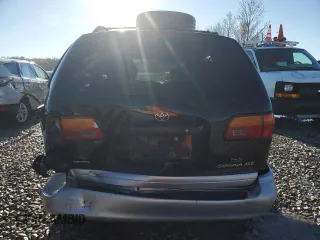 2000 Toyota Sienna LE with VIN 4T3ZF13C8YU207597, listed as a Copart auction lot 81250634 with 250,567 mi miles and Salvage Title. Bid and sale history available at carsss.com. Image 6.