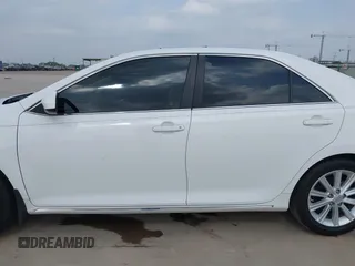 2014 Toyota Camry SE with VIN 4T1BK1FK5EU551196, listed as a IAAI auction lot 41912297 with 104,445 mi miles. Bid and sale history available at carsss.com. Image 14.