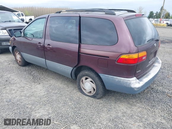 1999 Toyota Sienna LE with VIN 4T3ZF13C7XU152879, listed as a IAAI auction lot 41974953 with 201,644 mi miles. Bid and sale history available at carsss.com. Image 3.