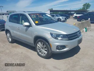 2012 Volkswagen Tiguan SE z VIN WVGAV7AX9CW536808, wystawiony jako IAAI lot #42199825 z przebiegiem 113 282 mil mil oraz . Historia ofert i sprzedaży dostępna na DreamBid. Obrazek 1.