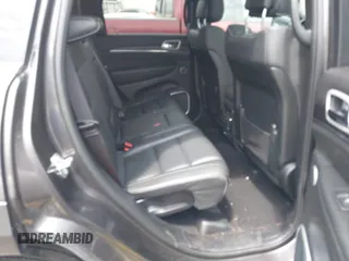 2020 Jeep Grand Cherokee Summit with VIN 1C4RJFJT0LC137054, listed as a IAAI auction lot 42235704 with 70,000 mi miles and . Bid and sale history available at DreamBid. Image 8.