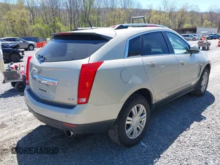 2013 Cadillac SRX Luxury Collection with VIN 3GYFNCE33DS600195, listed as a IAAI auction lot 42026606 with 136,592 mi miles. Bid and sale history available at carsss.com. Image 4.