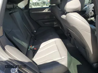 2023 BMW i4 eDrive40 with VIN WBY73AW0XPFR26365, listed as a Copart auction lot 56900944 with 15,017 mi miles and Salvage Title. Bid and sale history available at carsss.com. Image 11.