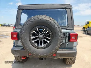 2024 Jeep Wrangler Rubicon X with VIN 1C4RJXFGXRW247781, listed as a Copart auction lot 64393745 with 2,661 mi miles and Salvage title. Bid and sale history available at DreamBid. Image 6.