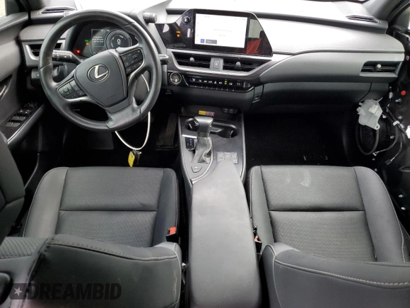 2023 Lexus UX 250h Premium с VIN JTHP6JBH8P2133821, выставлен на аукционе Copart как лот 61007355 с пробегом 32 540 миль миль и Списание • Salvage title. История ставок и продаж доступна на DreamBid. Изображение 8.