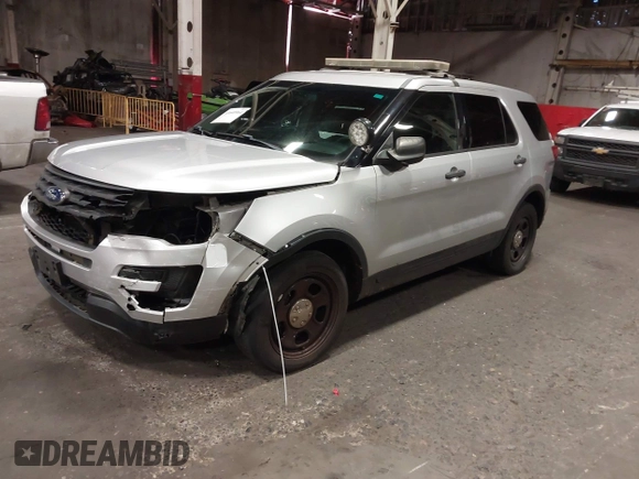 2016 Ford Police Interceptor Utility z VIN 1FM5K8AR2GGC06039, wystawiony jako IAAI lot #41640964 z przebiegiem 85 915 mil mil oraz . Historia ofert i sprzedaży dostępna na DreamBid. Obrazek 2.