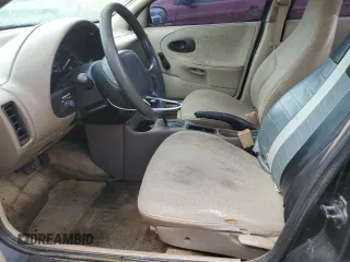 1999 Saturn SL z VIN 1G8ZH5280XZ178863, wystawiony jako Copart lot #73660474 z przebiegiem 195 738 mil mil oraz Szkody całkowita. Historia ofert i sprzedaży dostępna na DreamBid. Obrazek 7.