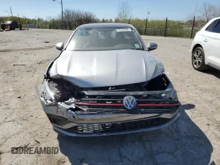 2019 Volkswagen Jetta GLI S z VIN 3VW6T7BU2KM254364, wystawiony jako Copart lot #53182095 z przebiegiem 63 972 mil mil oraz Szkody całkowita. Historia ofert i sprzedaży dostępna na DreamBid. Obrazek 5.
