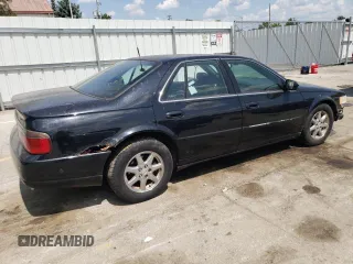 2001 Cadillac Seville Touring STS z VIN 1G6KY54961U257426, wystawiony jako Copart lot #45269275 z przebiegiem 177 990 mil mil oraz Nie do naprawy • Non repairable. Historia ofert i sprzedaży dostępna na DreamBid. Obrazek 3.
