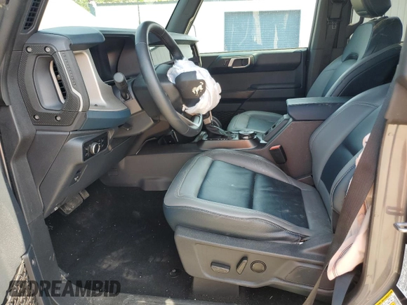 2024 Ford Bronco Outer Banks с VIN 1FMEE8BP1RLA57668, выставлен на аукционе Copart как лот 49614705 с пробегом 20 969 миль миль и Списание • Salvage title. История ставок и продаж доступна на DreamBid. Изображение 7.