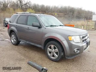 2011 Ford Escape Limited with VIN 1FMCU0EG7BKC50295, listed as a IAAI auction lot 41949076 with 186,859 mi miles. Bid and sale history available at carsss.com. Image 1.