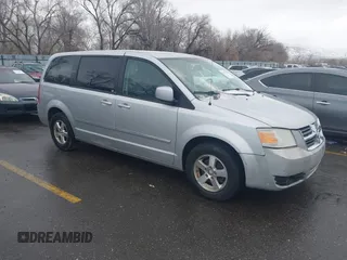 2008 Dodge Grand Caravan SXT z VIN 2D8HN54P98R731814, wystawiony jako IAAI lot #41605509 z przebiegiem 214 733 mil mil oraz . Historia ofert i sprzedaży dostępna na DreamBid. Obrazek 1.