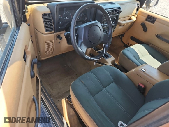 1997 Jeep Wrangler Sahara with VIN 1J4FY49S3VP519387, listed as a Copart auction lot 63822395 with 187,884 mi miles and Salvage title. Bid and sale history available at DreamBid. Image 8.