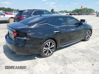 2016 Nissan Maxima SL z VIN 1N4AA6AP1GC381727, wystawiony jako IAAI lot #42275430 z przebiegiem 89 529 mil mil oraz . Historia ofert i sprzedaży dostępna na DreamBid. Obrazek 4.