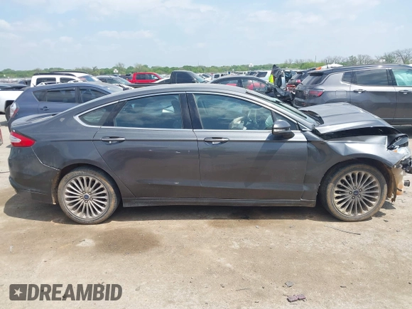 2016 Ford Fusion Titanium with VIN 3FA6P0K97GR217062, listed as a IAAI auction lot 42044943 with Not Provided miles and . Bid and sale history available at carsss.com. Image 14.