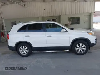 2013 Kia Sorento LX with VIN 5XYKT3A69DG370190, listed as a IAAI auction lot 42456161 with 170,196 mi miles and . Bid and sale history available at DreamBid. Image 13.