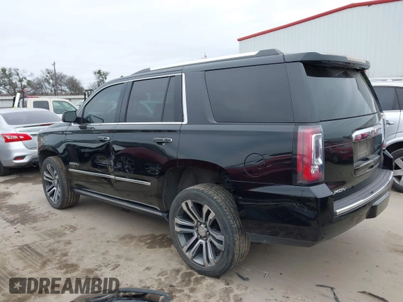 2018 GMC Yukon Denali with VIN 1GKS1CKJXJR300708, listed as a IAAI auction lot 41213592 with 110,789 mi miles. Bid and sale history available at carsss.com. Image 3.