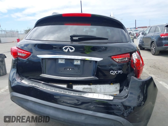 2014 Infiniti QX70 z VIN JN8CS1MW6EM410091, wystawiony jako IAAI lot #41896327 z przebiegiem 139 021 mil mil oraz . Historia ofert i sprzedaży dostępna na DreamBid. Obrazek 16.