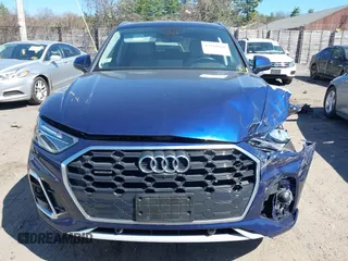 2023 Audi Q5 S line Premium Plus z VIN WA1EAAFY4P2052682, wystawiony jako IAAI lot #42118016 z przebiegiem 24 135 mil mil oraz . Historia ofert i sprzedaży dostępna na DreamBid. Obrazek 12.