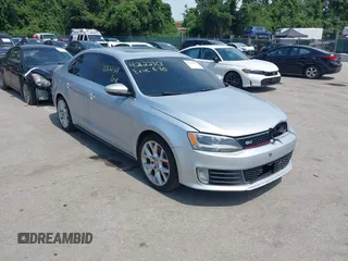 2014 Volkswagen Jetta GLI Autobahn with VIN 3VW5T7AJXEM310901, listed as a IAAI auction lot 42622301 with 139,821 mi miles and . Bid and sale history available at DreamBid. Image 1.