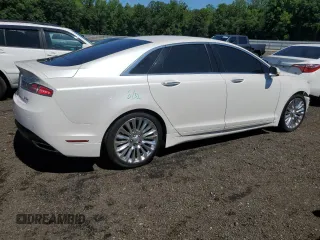 2015 Lincoln MKZ z VIN 3LN6L2JK8FR616661, wystawiony jako Copart lot #61588325 z przebiegiem 65 382 mil mil oraz Szkoda całkowita • Salvage title. Historia ofert i sprzedaży dostępna na DreamBid. Obrazek 3.