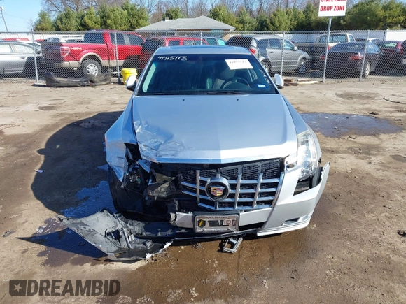 2013 Cadillac CTS Premium with VIN 1G6DP5E39D0100975, listed as a IAAI auction lot 41915113 with 110,436 mi miles and . Bid and sale history available at DreamBid. Image 11.