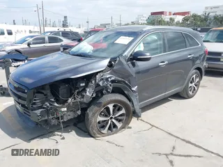 2017 Kia Sorento EX with VIN 5XYPH4A51HG318594, listed as a IAAI auction lot 41902724 with 113,498 mi miles and . Bid and sale history available at carsss.com. Image 2.