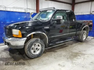 1999 Ford F-250 XL with VIN 1FTNX21SXXEE02893, listed as a Copart auction lot 75717534 with 127,574 mi miles and Clean title. Bid and sale history available at DreamBid. Image 1.