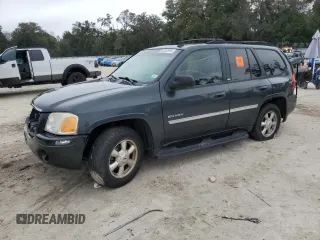 2006 GMC Envoy SLE with VIN 1GKDS13S562135135, listed as a Copart auction lot 88353995 with 159,251 mi miles and Salvage Title. Bid and sale history available at carsss.com. Image 1.