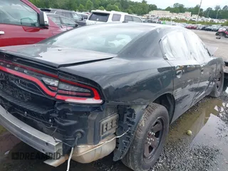 2021 Dodge Charger Police with VIN 2C3CDXAT2MH551264, listed as a IAAI auction lot 42210195 with 58,268 mi miles and . Bid and sale history available at DreamBid. Image 4.