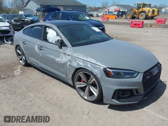 2019 Audi RS 5 Sportback z VIN WUABWCF53KA907286, wystawiony jako IAAI lot #42098943 z przebiegiem 62 275 mil mil oraz . Historia ofert i sprzedaży dostępna na DreamBid. Obrazek 1.
