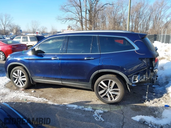 2017 Honda Pilot Touring with VIN 5FNYF6H99HB105446, listed as a IAAI auction lot 41283368 with 91,452 mi miles and . Bid and sale history available at DreamBid. Image 15.