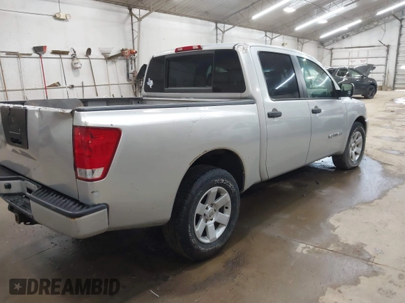 2009 Nissan Titan SE with VIN 1N6BA07D29N304233, listed as a IAAI auction lot 42013084 with 191,407 mi miles. Bid and sale history available at carsss.com. Image 4.