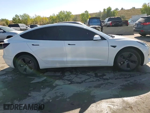 2022 Tesla Model 3 Long Range z VIN 5YJ3E1EB8NF315619, wystawiony jako Copart lot #73309884 z przebiegiem 34 811 mil mil oraz Szkoda całkowita • Salvage title. Historia ofert i sprzedaży dostępna na DreamBid. Obrazek 13.