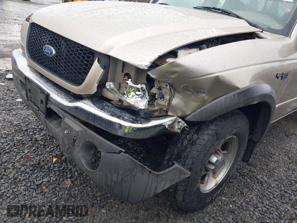2002 Ford Ranger XL z VIN 1FTZR15E92PB61299, wystawiony jako IAAI lot #41471659 z przebiegiem 156 466 mil mil oraz . Historia ofert i sprzedaży dostępna na DreamBid. Obrazek 6.