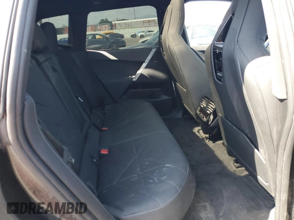 2025 BMW iX xDrive50 z VIN WB523CF02SCS06555, wystawiony jako Copart lot #55291115 z przebiegiem Nie podano mil oraz Szkoda całkowita • Salvage title. Historia ofert i sprzedaży dostępna na DreamBid. Obrazek 11.