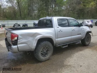 2020 Toyota Tacoma 4WD SR5 with VIN 3TMCZ5AN6LM310312, listed as a Copart auction lot 50162955 with 82,710 mi miles and Salvage Title. Bid and sale history available at carsss.com. Image 3.