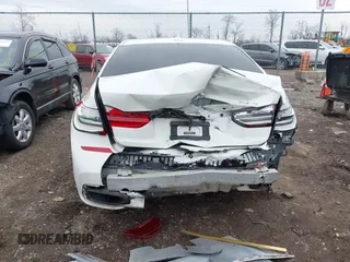 2016 BMW 7 Series 740i with VIN WBA7E2C50GG714647, listed as a IAAI auction lot 41745442 with 134,399 mi miles and . Bid and sale history available at carsss.com. Image 6.