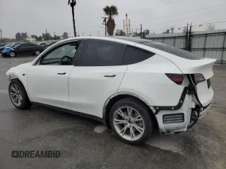 2020 Tesla Model Y Long Range with VIN 5YJYGDEE5LF053938, listed as a Copart auction lot 43381985 with 69,291 mi miles and Salvage Title. Bid and sale history available at DreamBid. Image 2.