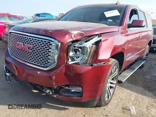 2017 GMC Yukon Denali with VIN 1GKS1CKJ4HR141145, listed as a IAAI auction lot 40799652 with 104,369 mi miles. Bid and sale history available at carsss.com. Image 6.