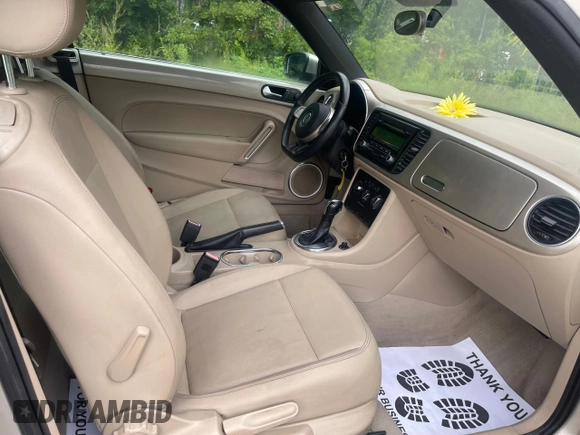 2013 Volkswagen Beetle 2.5L with VIN 3VW5X7AT2DM825928, listed as a Copart auction lot 66500855 with 48,795 mi miles and Salvage title. Bid and sale history available at DreamBid. Image 5.