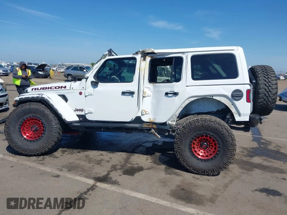 2018 Jeep Wrangler Unlimited Rubicon with VIN 1C4HJXFGXJW110629, listed as a IAAI auction lot 42141572 with 65,973 mi miles and . Bid and sale history available at DreamBid. Image 14.
