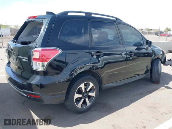2017 Subaru Forester with VIN JF2SJABC5HH450342, listed as a IAAI auction lot 41872990 with 98,924 mi miles. Bid and sale history available at carsss.com. Image 4.